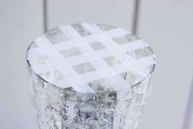 Scotch tape grid over vase