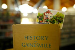 Library card in a book titled History of Gainesville