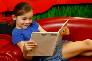 Girl reading in a library