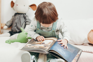 child reading a picture book
