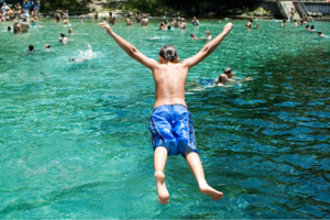jumping into a fresh water spring