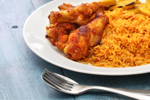 dinner plate with yellow rice and meat