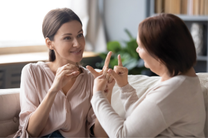 two people communicated with sign language