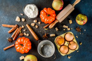 fall cooking display with small pumpkins