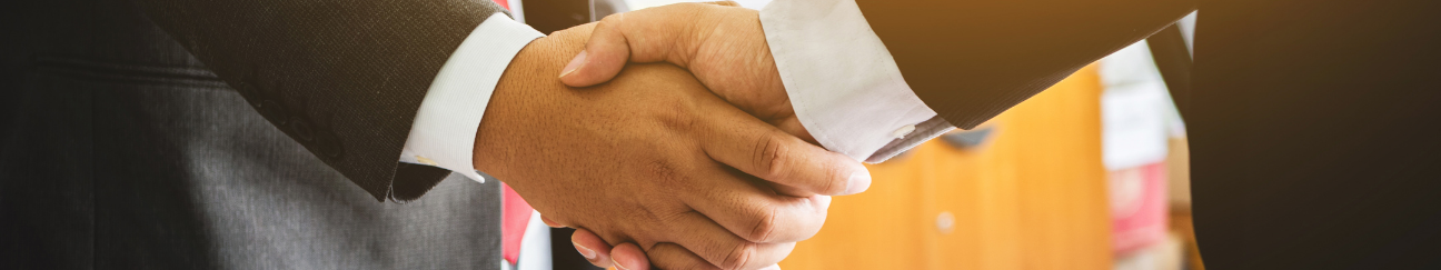header of businesspeople shaking hands