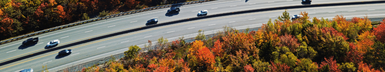 Cars driving on highway in Autumn