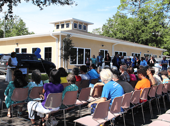 new Library Partnership Branch grand opening ceremony outside the building