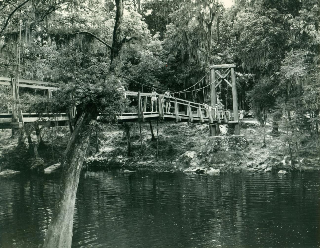 people on bridge over Santa Fe River at O'Leno State Park