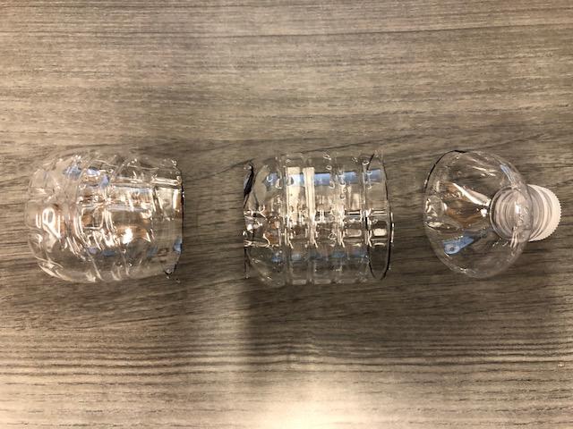 An image of a water bottle cut into three sections