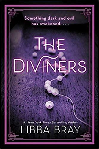 Book cover featuring a broken strand of pearls and the title "The Diviners Libba Bray"