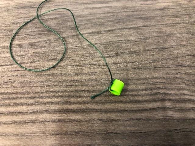 End Bead Bead Tied to the End of a Thread
