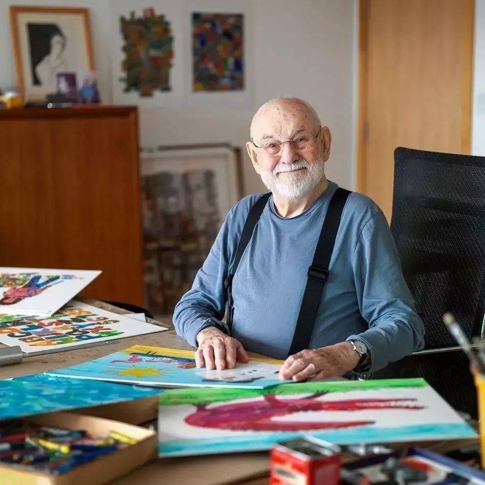 Eric Carle at his desk 