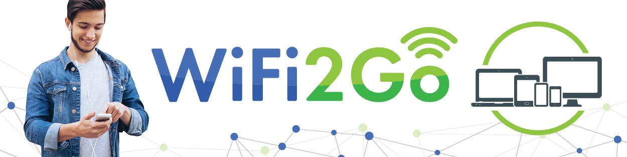 WiFi2Go with person on a cellphone and computers