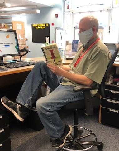 Mr. John Caught Reading