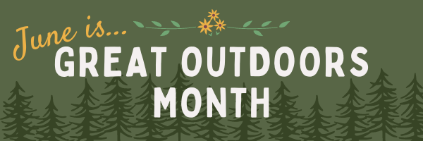 June is Great Outdoors Month The words "June is..." in yellow on a dark green background, sitting atop the words "Great Outdoors Month" in white. There are small yellow flowers above the words and forest green pine trees behind them.