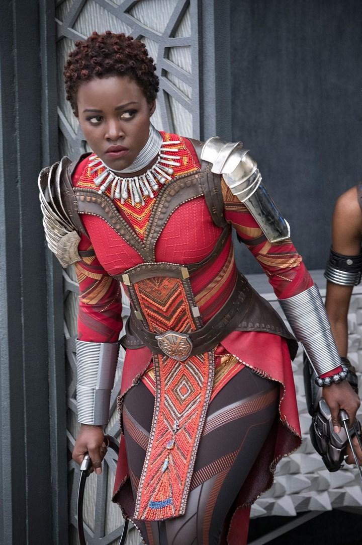 A screenshot from the movie Black Panther focused on the character Nakia