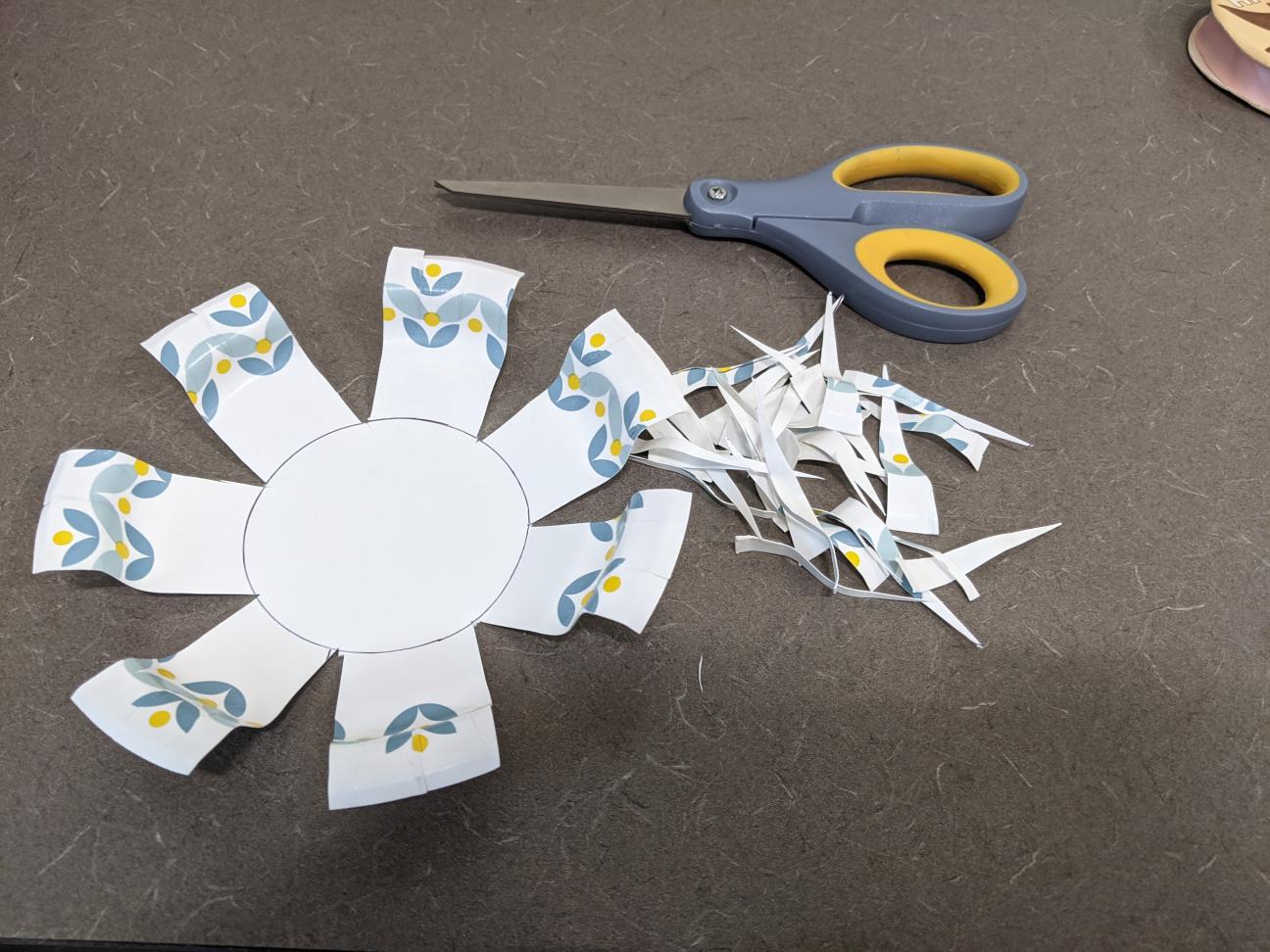 Extend your V-shape! The same paper plate, with more cut off the edges to make the V-shape bigger.