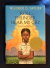 African american girl on the book cover with her arms folded across her chest