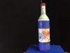 bottle with pictures and embellishments