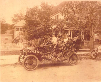 Esther Serena Jordan with children in decorated car