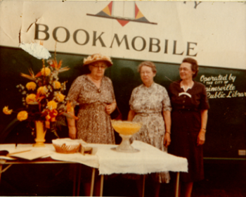 Women celebrating library service in Hawthorne