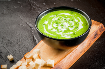 Green Garlic and Pea Soup with Whipped Cream