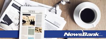 Tablet with a newspaper website on it beside a cup of coffee and the text Newsbank