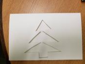 Tree shape cut into front of greeting card