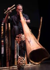 Man playing a didgeridoo