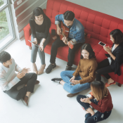 teens hanging out on couch and floor