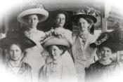 black and white photo of early members of the Woman’s Club include: Mrs. E. R. Anderson, Mrs. L.C. Gracy, Mrs. H. McL. Grady, Mrs. A.D. Kean, Mrs. G.W. McCall, Mrs. A.J. Morre, and Mrs. James Paul