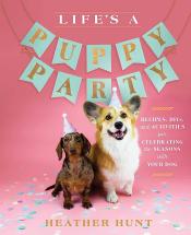 pink book cover with party sign and confetti, two dogs wearing party hats