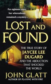 Black and yellow book cover, picture of tent, picture of girl holding a red bag