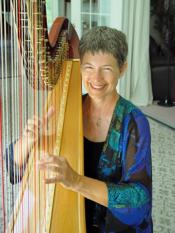 Harpist Barbara Kerkhoff playing her harp.