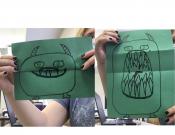 a photo of a "nice" monster while folded, a second photo where paper is opened up to reveal "scary" monster