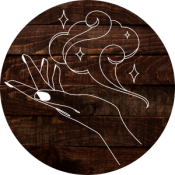 Sorcerer Image of fire floating over a woman's hand.