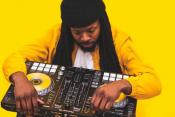 Man holding DJ controller Man holding DJ controller