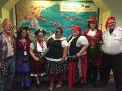 Talk Like a Pirate Day in the library library staff dressed up as pirates