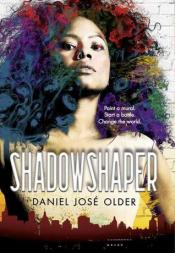 The cover of Shadowshaper by Daniel Jose Older, with a photo of a teenage Afro-Latina girl.
